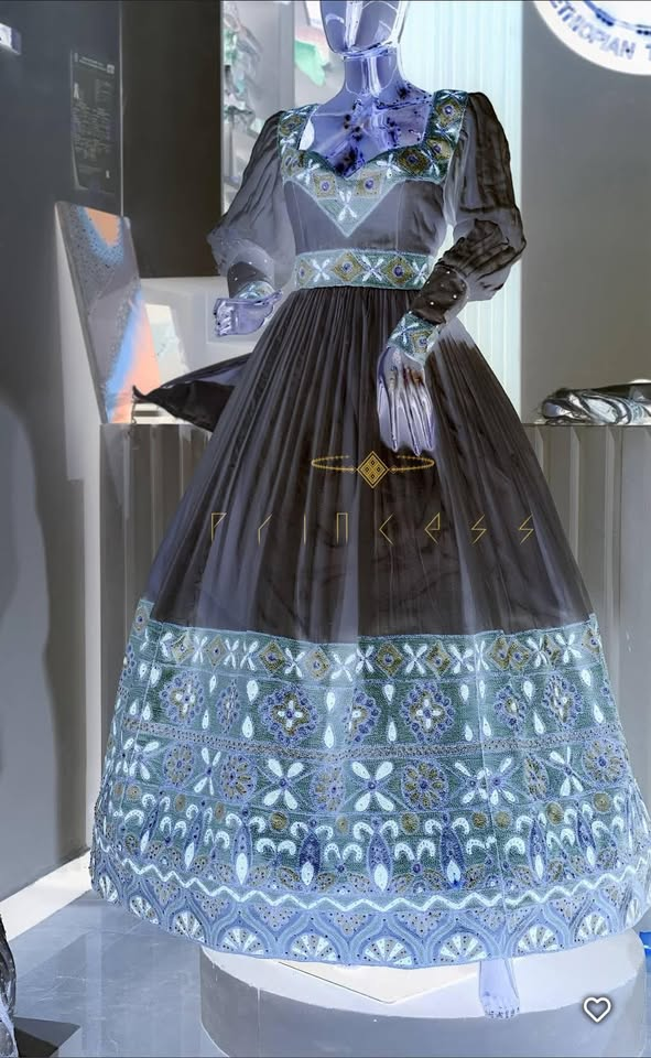Midnight Tulle Kemis — Sheer layered tulle over a jewel-toned tibeb band — a modern evening take.